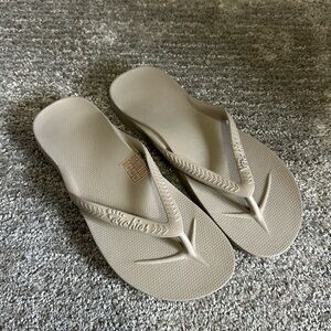 Archie’s flip flops- never worn